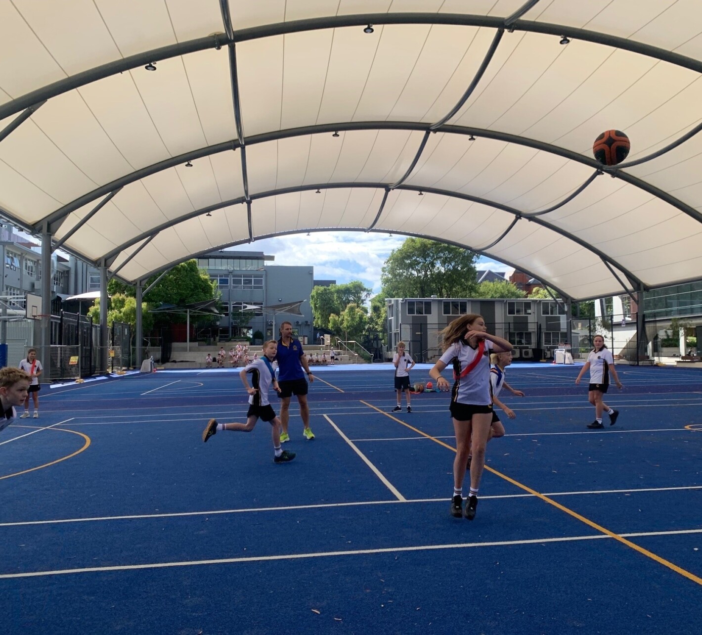 An example of the all-weather cover over Macafee Courts at the Kew campus