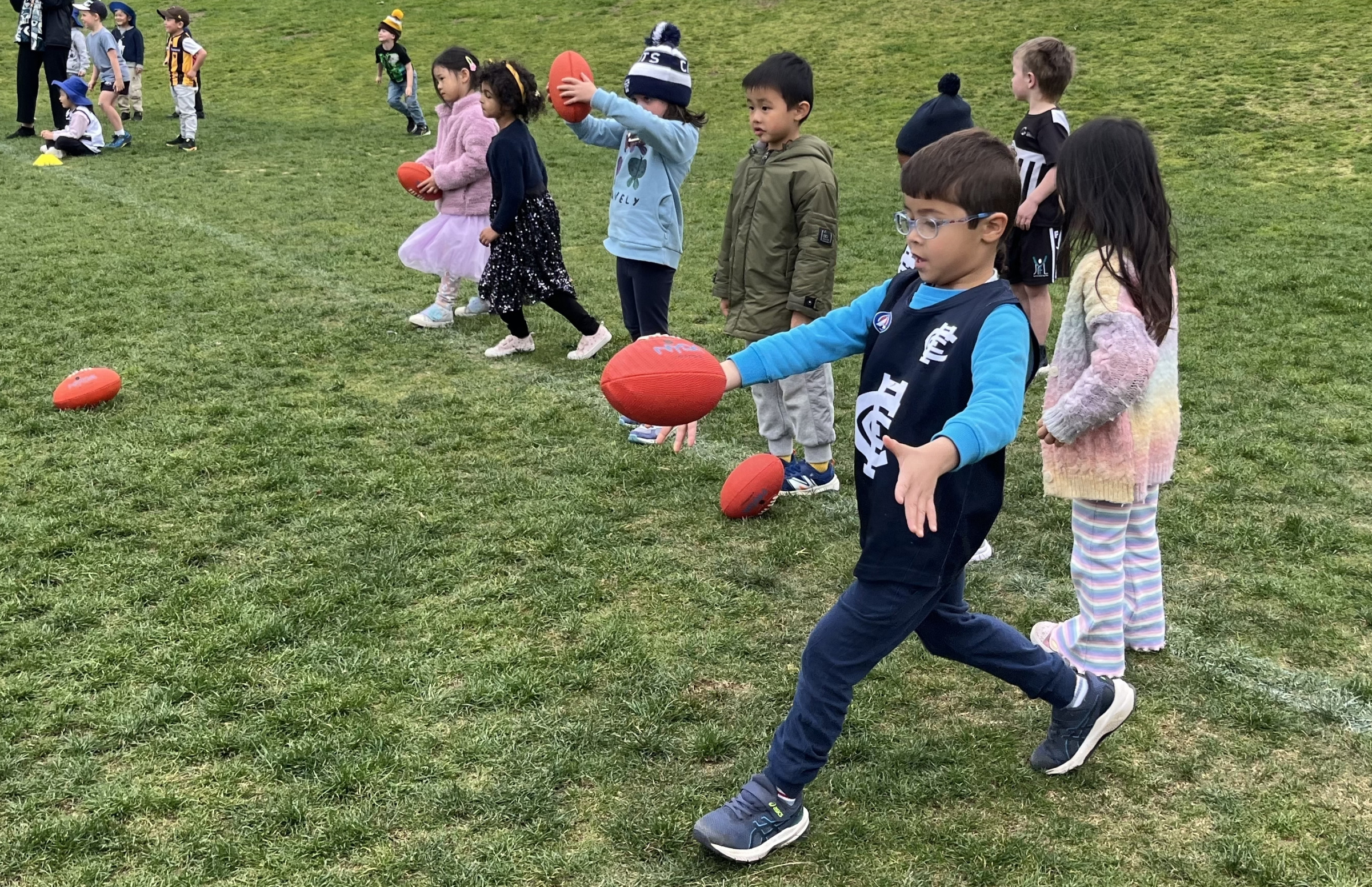 Learning from the best: our Year 12s teach footy to the ELC