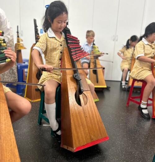 Year 1s experimenting with echo cellos